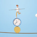 綱渡りする人形と時計